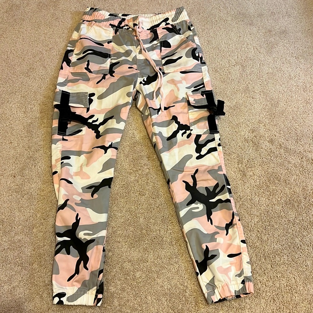 Cargo pants, pink black white and gray design.